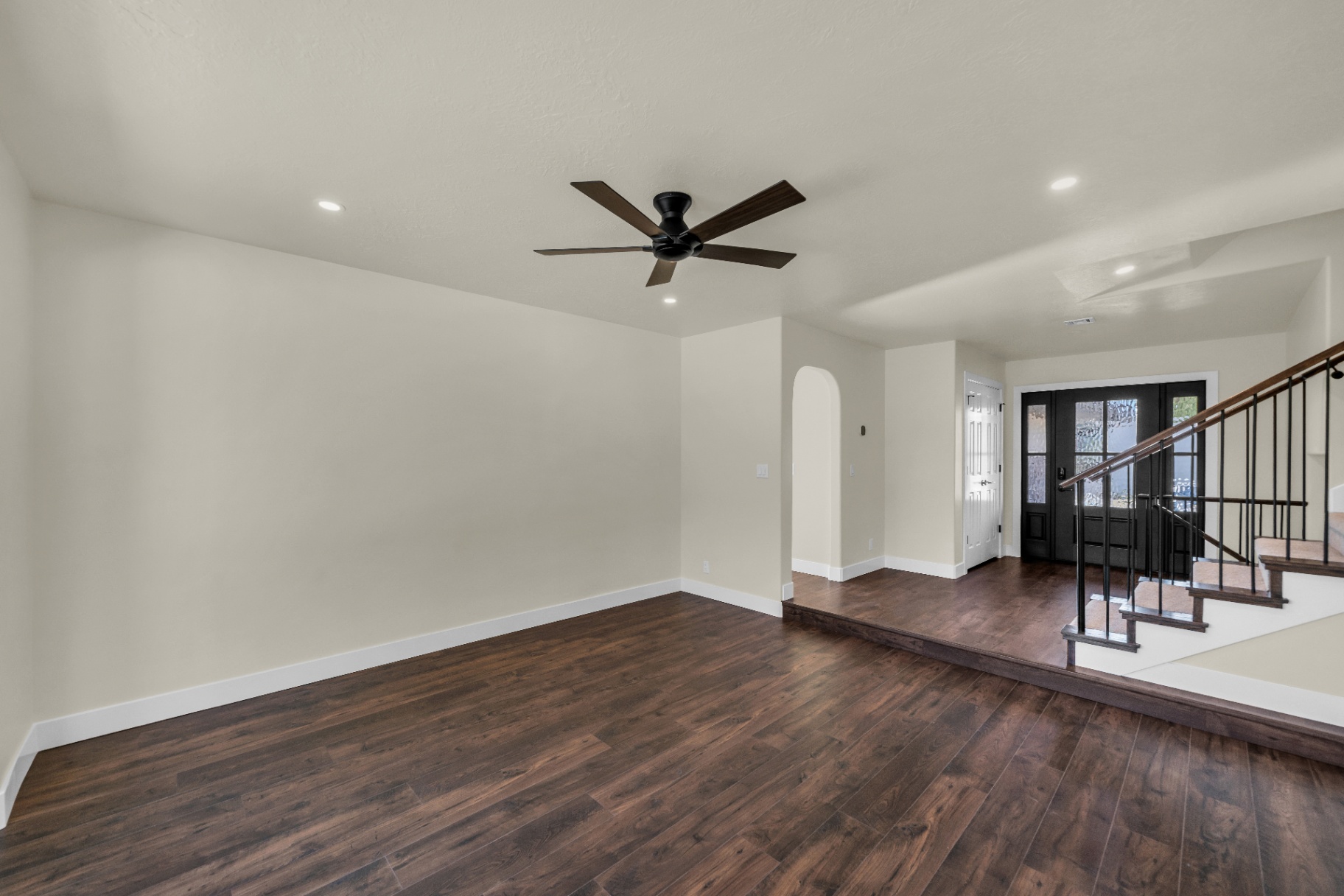 Prestigious whole-home remodel living area and staircase